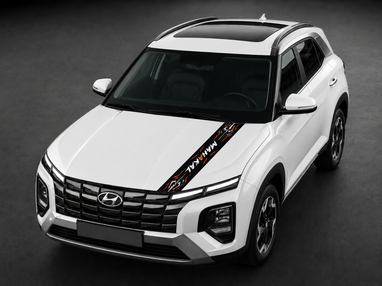 Mahakal Trishul saffron bonnet wrap on white SUV bonnet