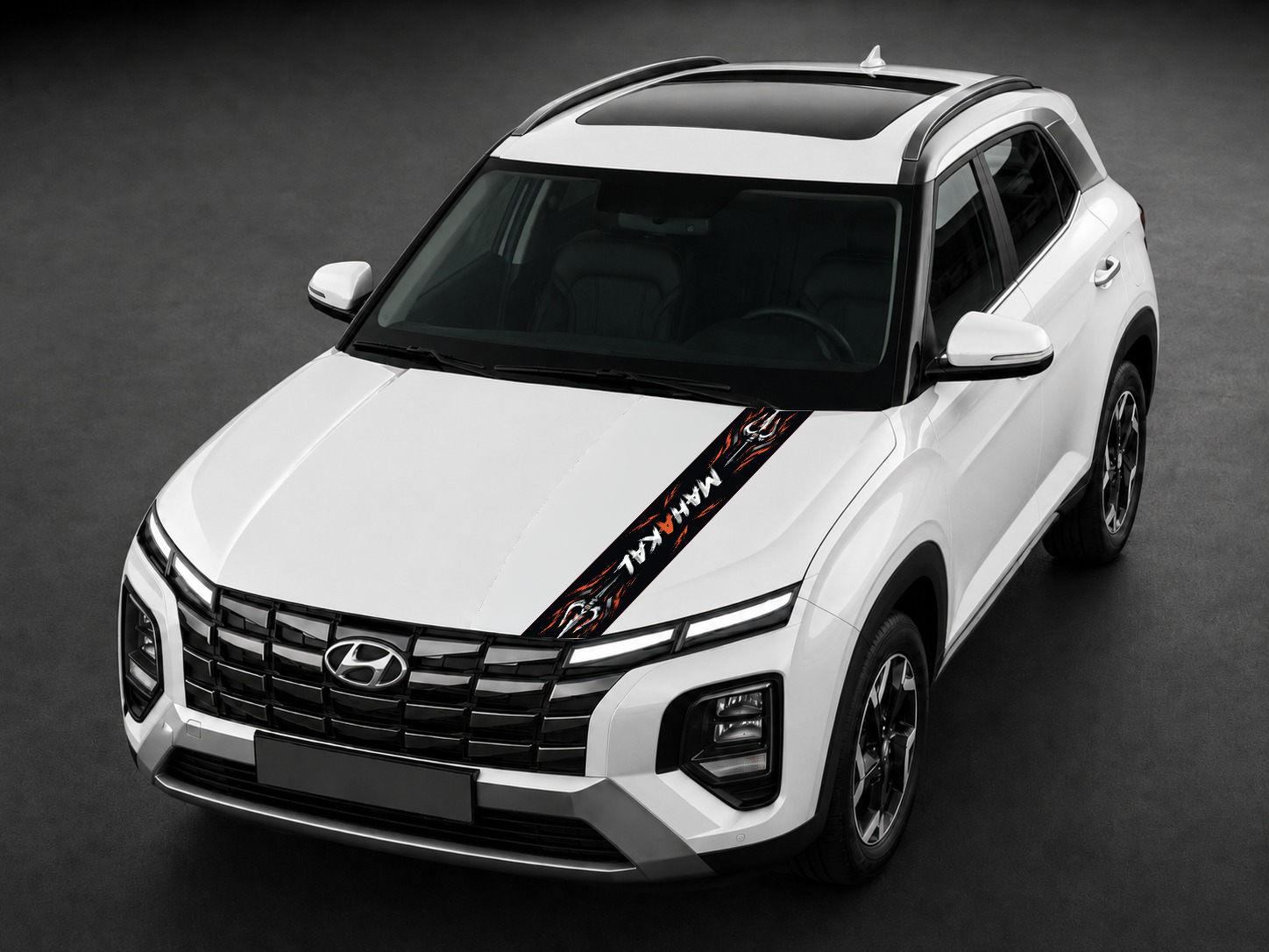 Mahakal Trishul saffron bonnet wrap on white SUV bonnet